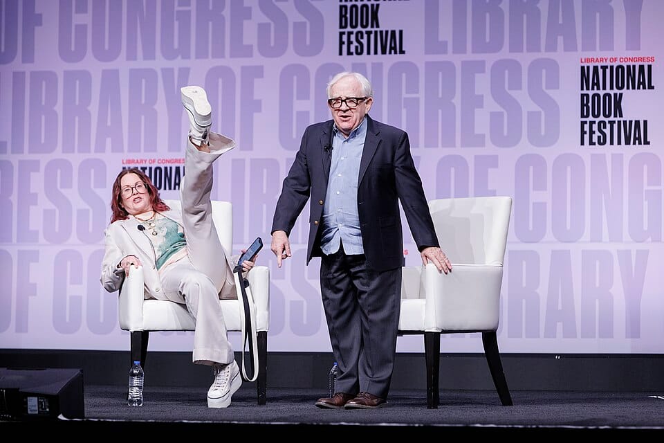Megan Mullally and Leslie Jordan on stage at the 2022 National Book Festival 